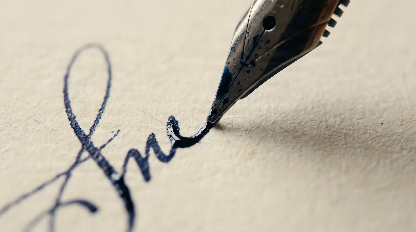 A metal seal pressed into paper, macro